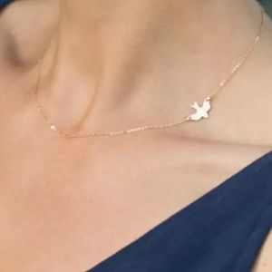 GOLD BIRD PENDANT NECKLACE